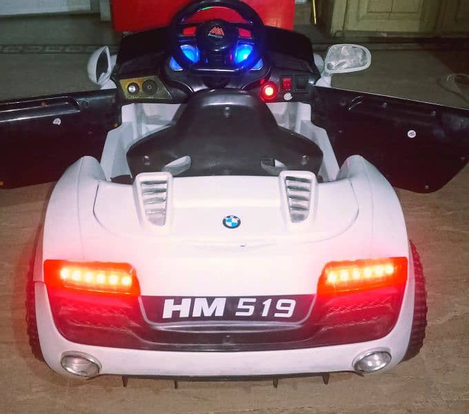 BMW Kids car with remotecontrol & swing function/Lights, music, All ok 4