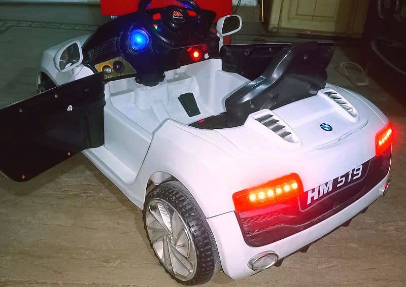 BMW Kids car with remotecontrol & swing function/Lights, music, All ok 6