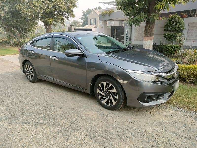 Honda Civic Oriel 2016 UG Full option 4