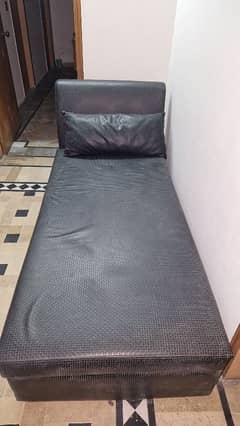 Single leather bed with cushion