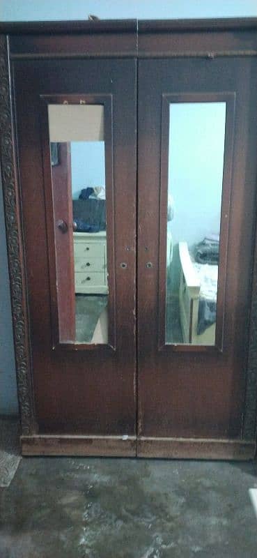 A two door cupboard  . . . 1