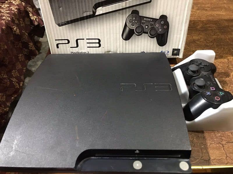 ps3 slim 9/10 condition, gta 5 etc games 0