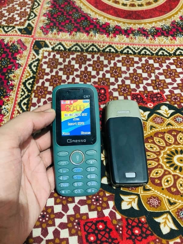 Nokia 1100 and Gresso CR7 1