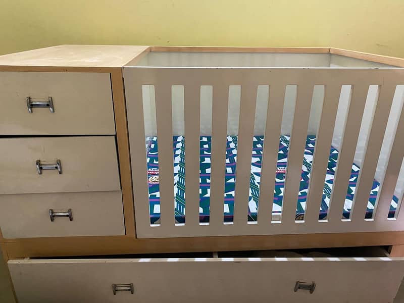 1 year used baby cot 1