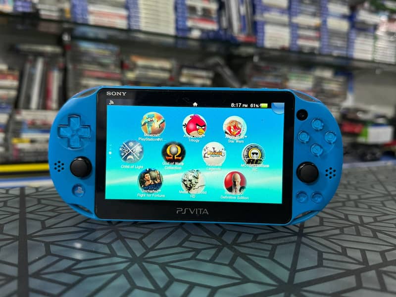 PS VITA SLIM BLUE + 64GB JAILBREAK IN MINT CONDITION AT MY GAMES 3