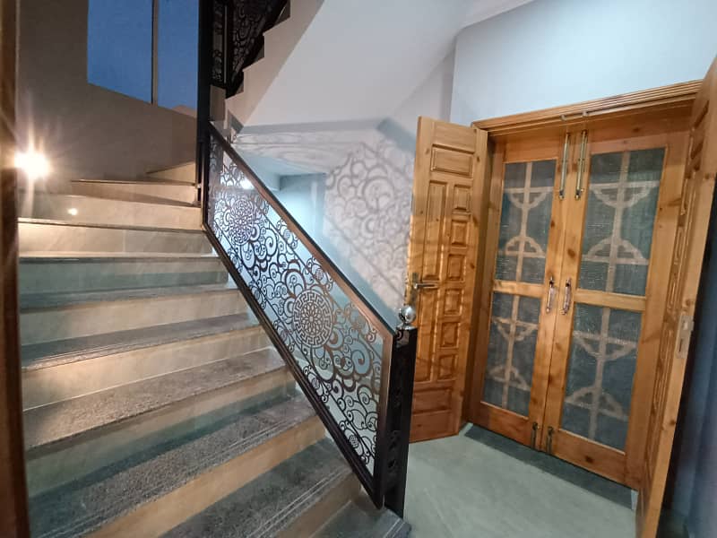 Double story house sale location Habibullah Colony 13