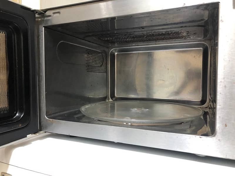 Microwave  oven 100percent  working  condition steel body 1