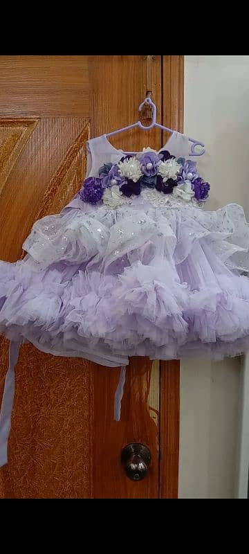 baby frock. lavender colour 0