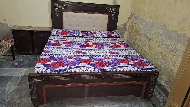 beautiful wooden bed with side table and dressing 3