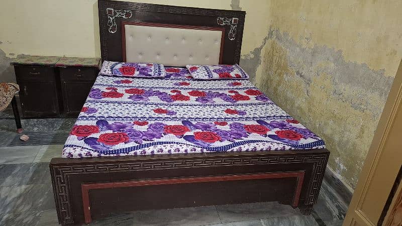 beautiful wooden bed with side table and dressing 5