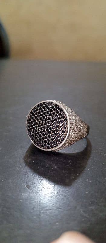 Pure chandi ring with small original zirkon stones. 0