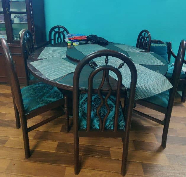 Big round wooden dining table with 6 chairs 0