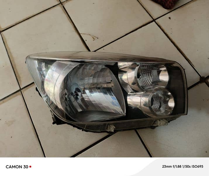 genuine new cultus complete headlight right side 0