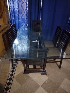 Dining table with 6 wooden chairs