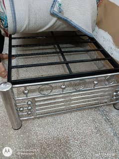 Two single steel beds