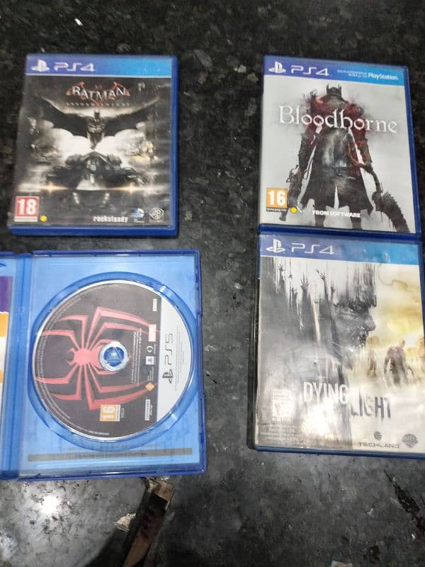 Bloodborne,batman,dying light and miles morales CDs 0