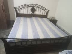 king size bed with dressing and 2 side tables