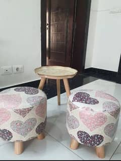 2 stools with table from haroon. 2 bean bags. 6 chenone cushions