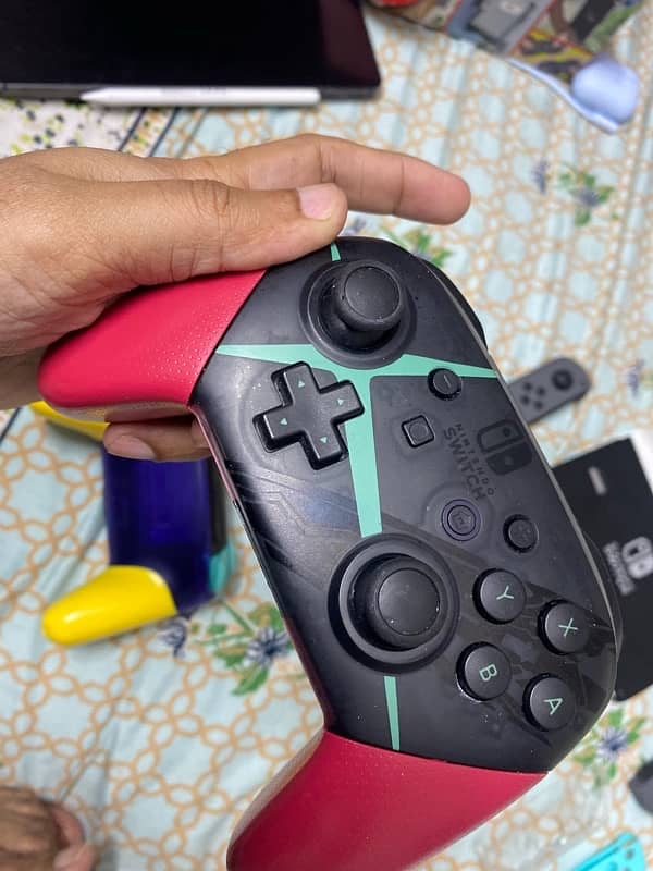 Nintendo Switch (v2) second gen with PRO Controllers 3