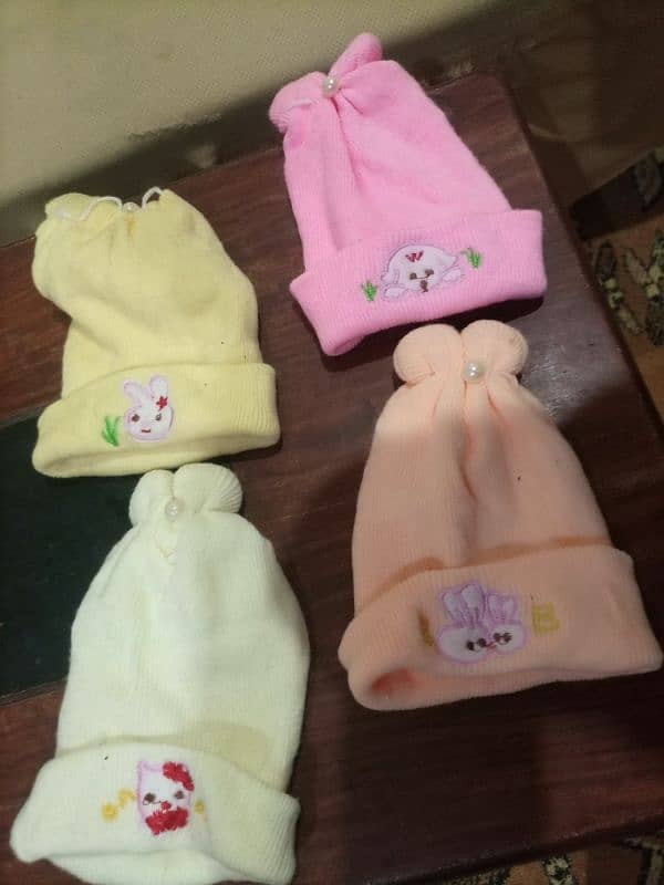 new born baby warm winter caps in good condition 1