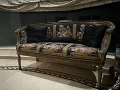 Elegant 2-seater black floral sofa with wooden structure & 3 cushions