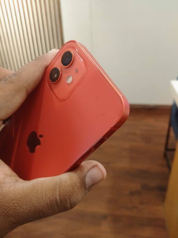 Iphone 12 in Red color with wireless charging case 3