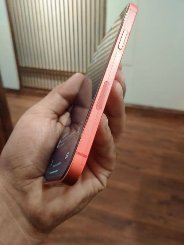 Iphone 12 in Red color with wireless charging case 4