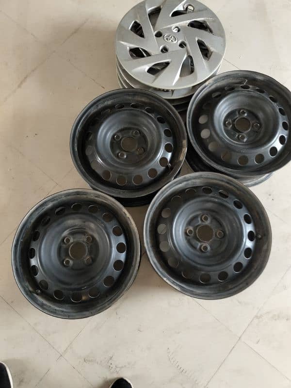 Toyota aqua rims nd cover 15" 1