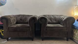 Two single seat chesterfield sofas