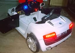 BMW imported Kids car with remotecontrol & swing mode/Lights,music, OK