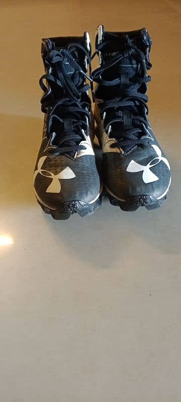 Under Armour football studs 0