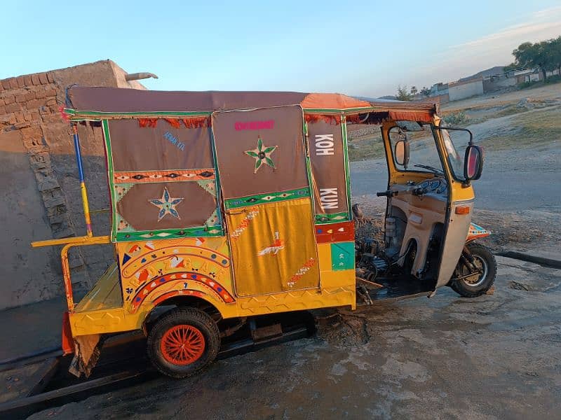 rozgar 9 seater rickshaw 12