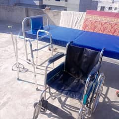 hospotal bed with mattress, wheel chair and walking stick