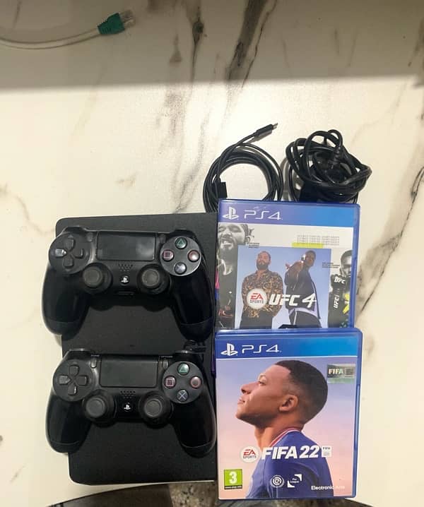 PS4 Slim with 2 games and 2 Controllers 2