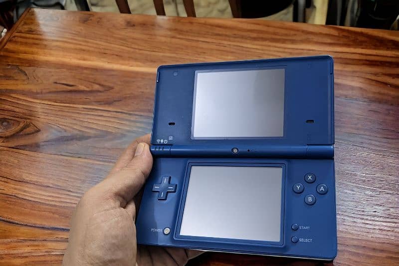 Nintendo DSi with charger 3