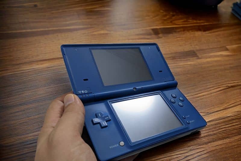 Nintendo DSi with charger 4