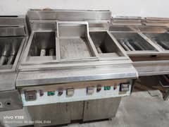 used deep fryer double tank with centre tray . pizza oven fast food