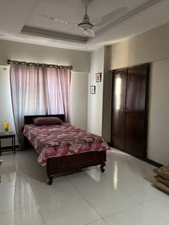 Furnish room available in E-11/4 for single lady only