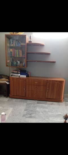 Spacious Cupboard with chester and glass bookshelf