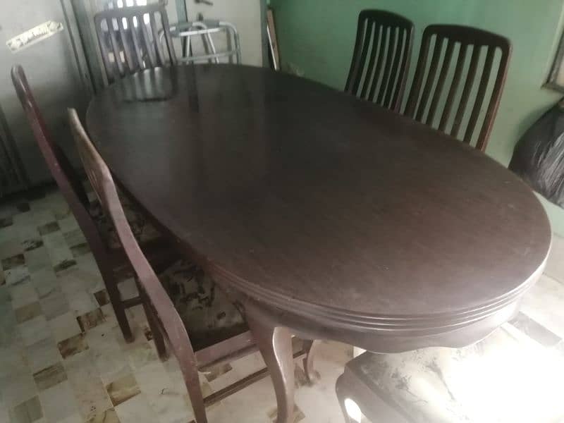 Pure brown wooden dining table with six chairs 1