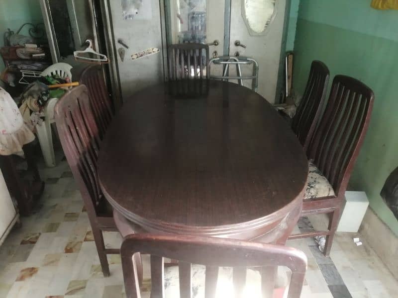 Pure brown wooden dining table with six chairs 2