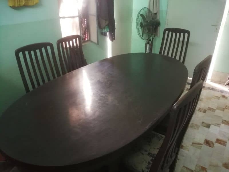 Pure brown wooden dining table with six chairs 4