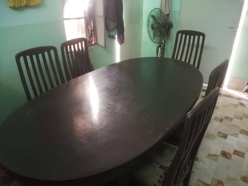 Pure brown wooden dining table with six chairs 6