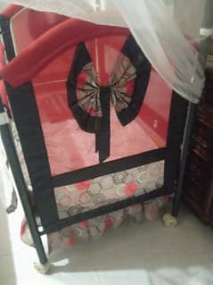 baby swing and bed