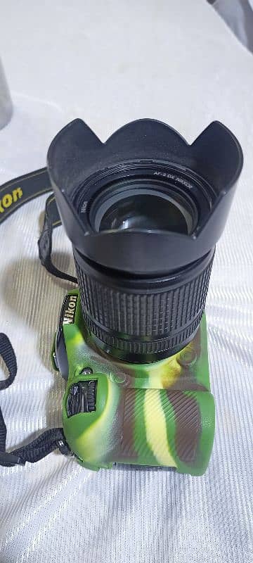 Nikon D7100 with lens 18-140 3