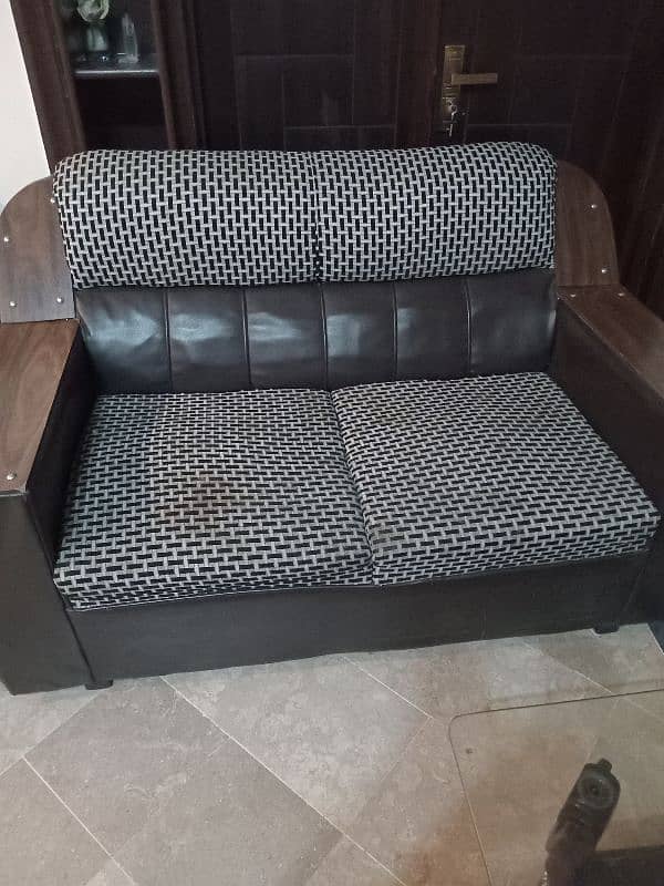 Six seater Sofa and glass table for sale 1