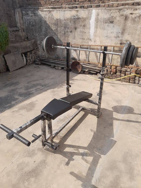 Bench With Barbell Stand and Leg Extension 0