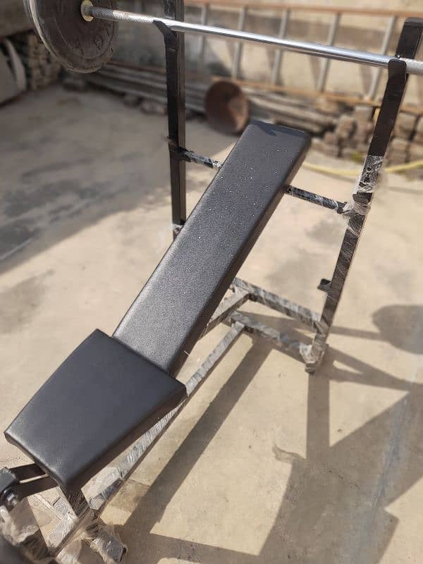 Bench With Barbell Stand and Leg Extension 2