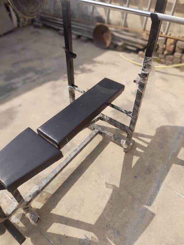 Bench With Barbell Stand and Leg Extension 3