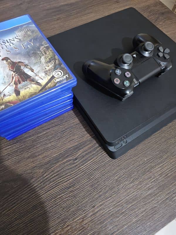 PS 4 slim with original controller and 7 games 2